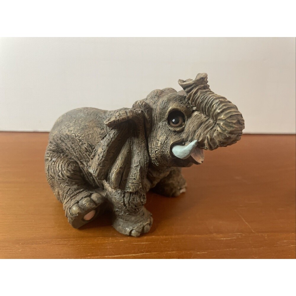 Vintage elephant figurine "Flip" from The Herd collection by Marty Sculpture Art